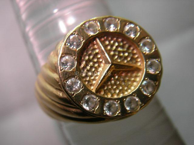 sello-mercedes en oro y plata