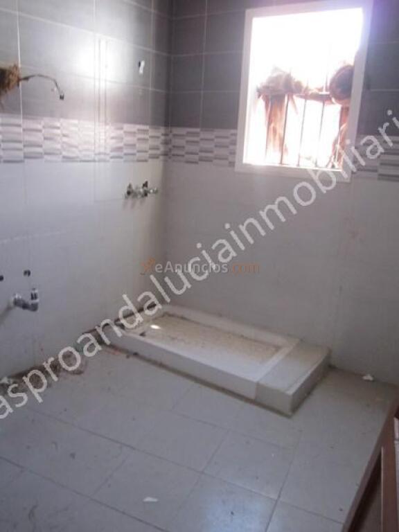 CASA ADOSADA DE UNA PLANTA