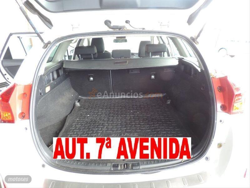 Toyota Auris Hybrid Active Touring Sports de 2015 con 155.000 Km por 7.500 EUR. en Badajoz